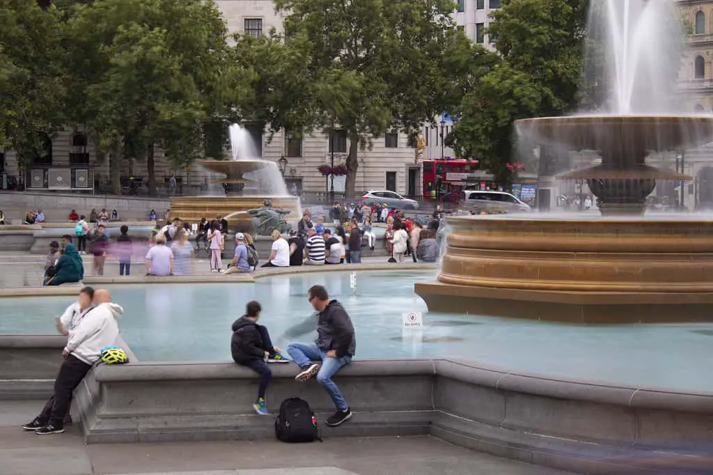 What is Shutter Speed in Photography? Trafalgar square fountains. Water shown hazy with a slow shutter speed.