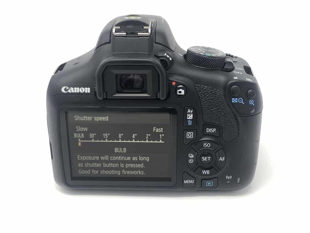 What is Shutter Speed in Photography? DSLR camera rear screen shown with shutter speed menu and bulb setting.