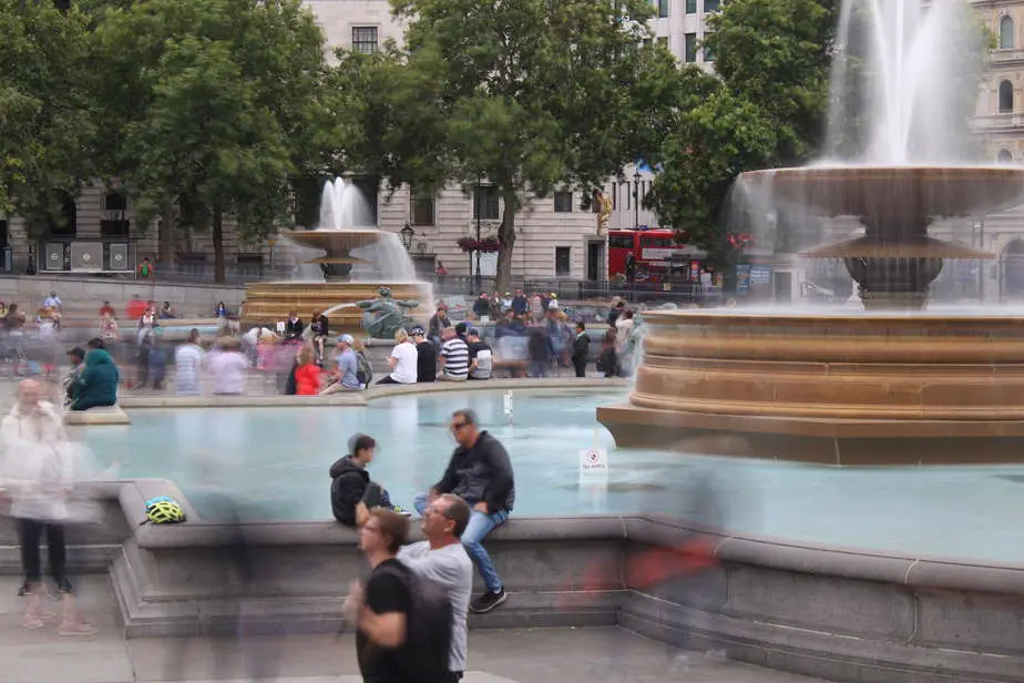 What is Aperture in Photography? Slow shutter speed misty water sprays of the fountains of trafalgar square.
