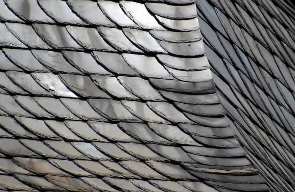 What is Composition in Photography? Curved slate tile roof with strong contrasting shadows.