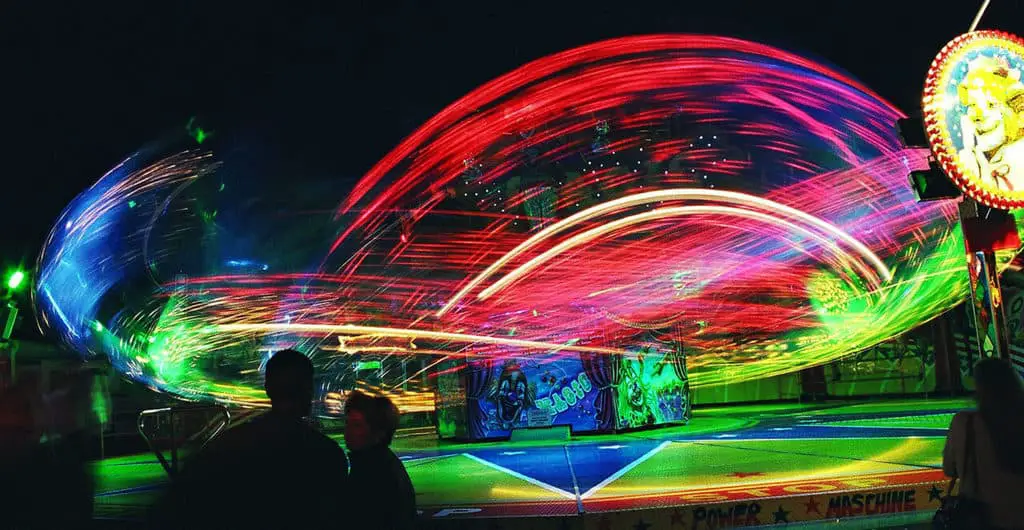 How to Capture Motion Blur in Photography! Fairground motion carousel at night.