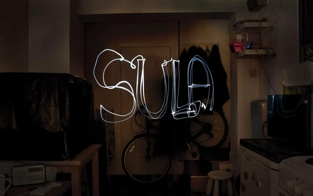 How to Capture Motion Blur in Photography! Light painting letters in the air.