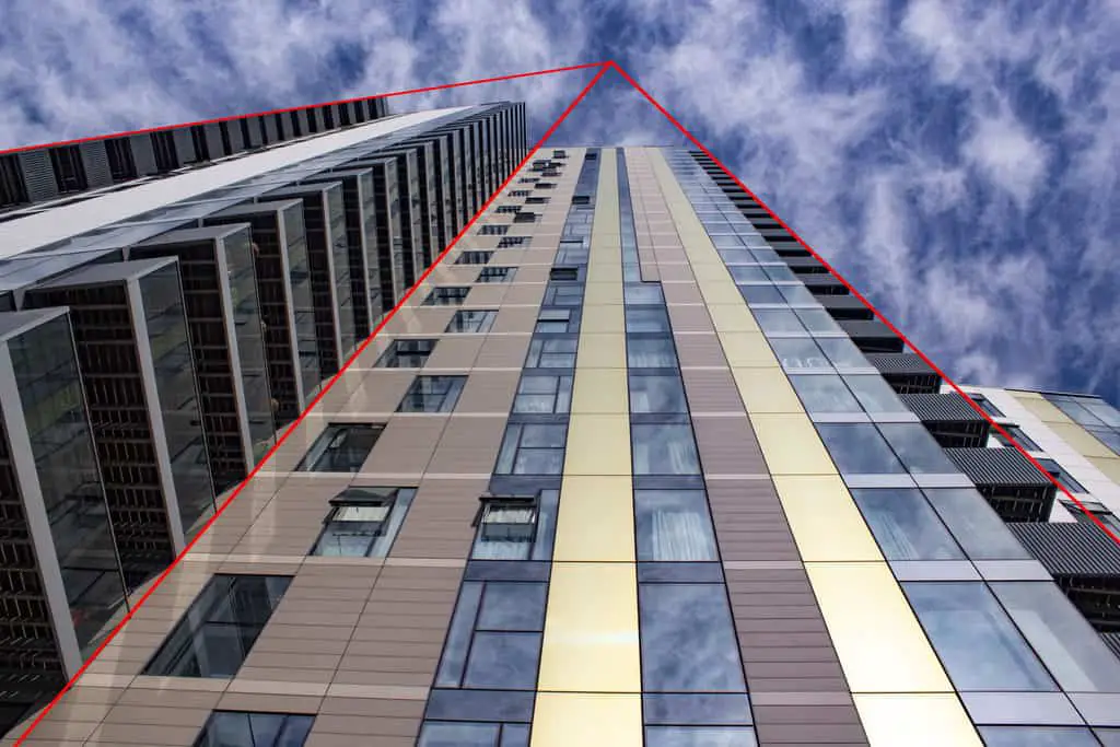 Why do Buildings Lean in Photos? Vertical perspective with vanishing point.
